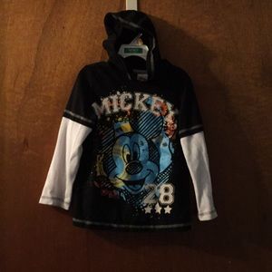 Bundle of four boys long sleeve shirts.